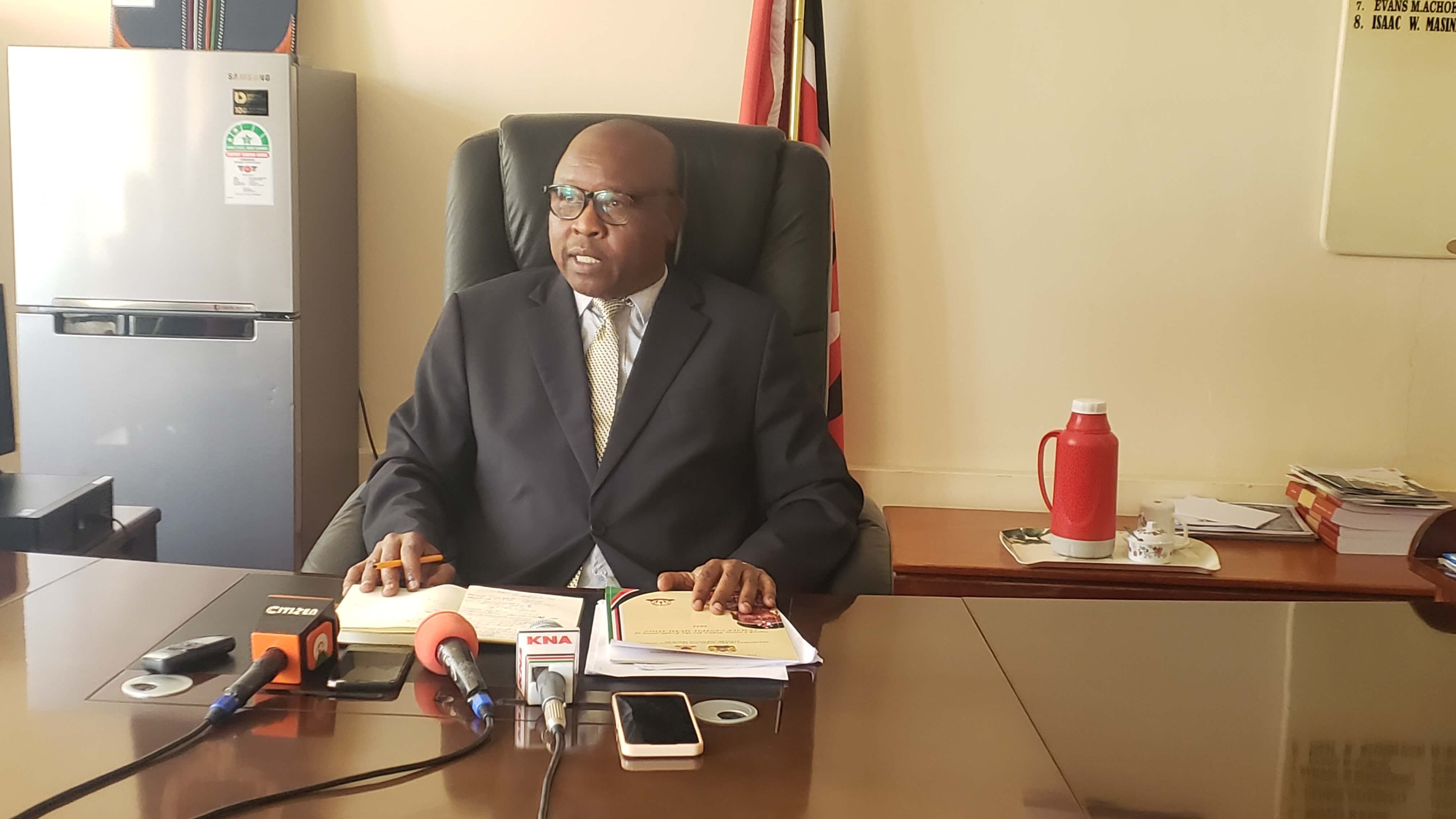 Narok County Commissioner Kipkech Lotiatia speaking at his office