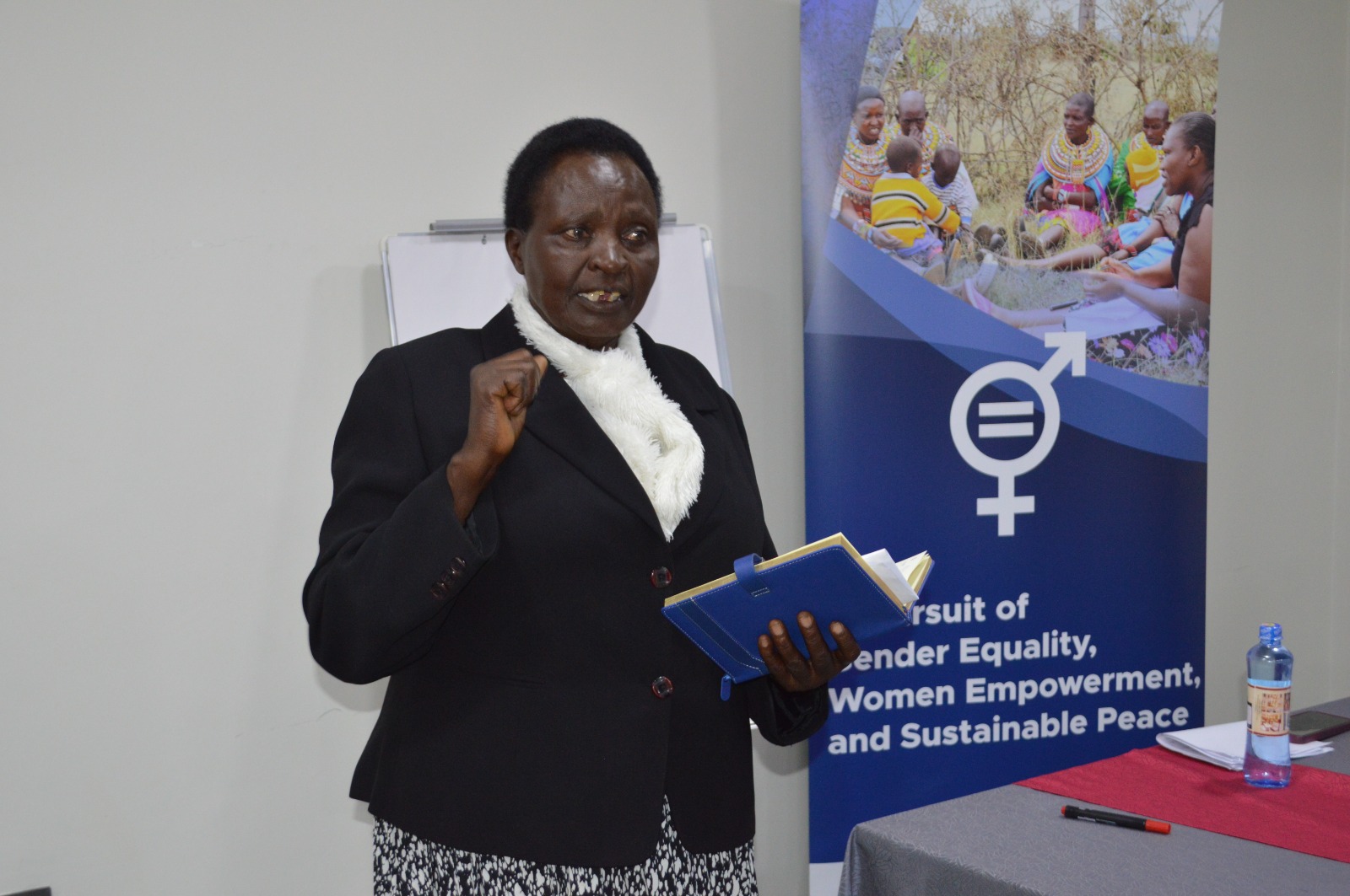 Uasin Gishu-based gender and peace activist Esther Kangogo speaks during a recent media training organized by the African Woman and Child Feature Service (AWC) in Eldoret Town. Photo/Patricia Mollyne Mataga.