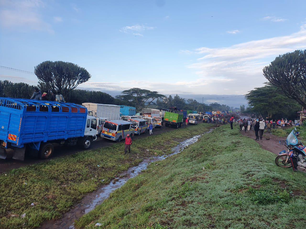 Traffic along Narok-Mai Mahiu Road that has been rendered impassable